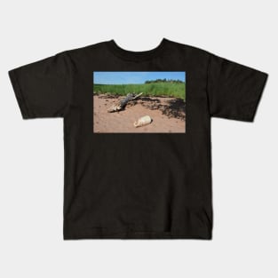 Adrift on the beach Kids T-Shirt